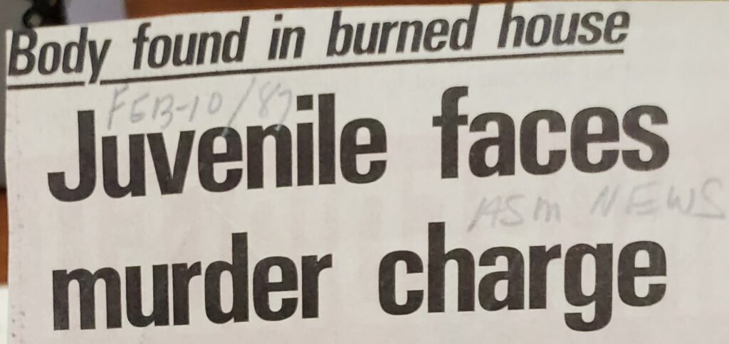 News headline that reads "Body found in burned house Juvenile faces murder charge"